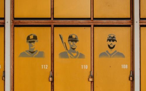 Baseball team faces stenciled on locker doors